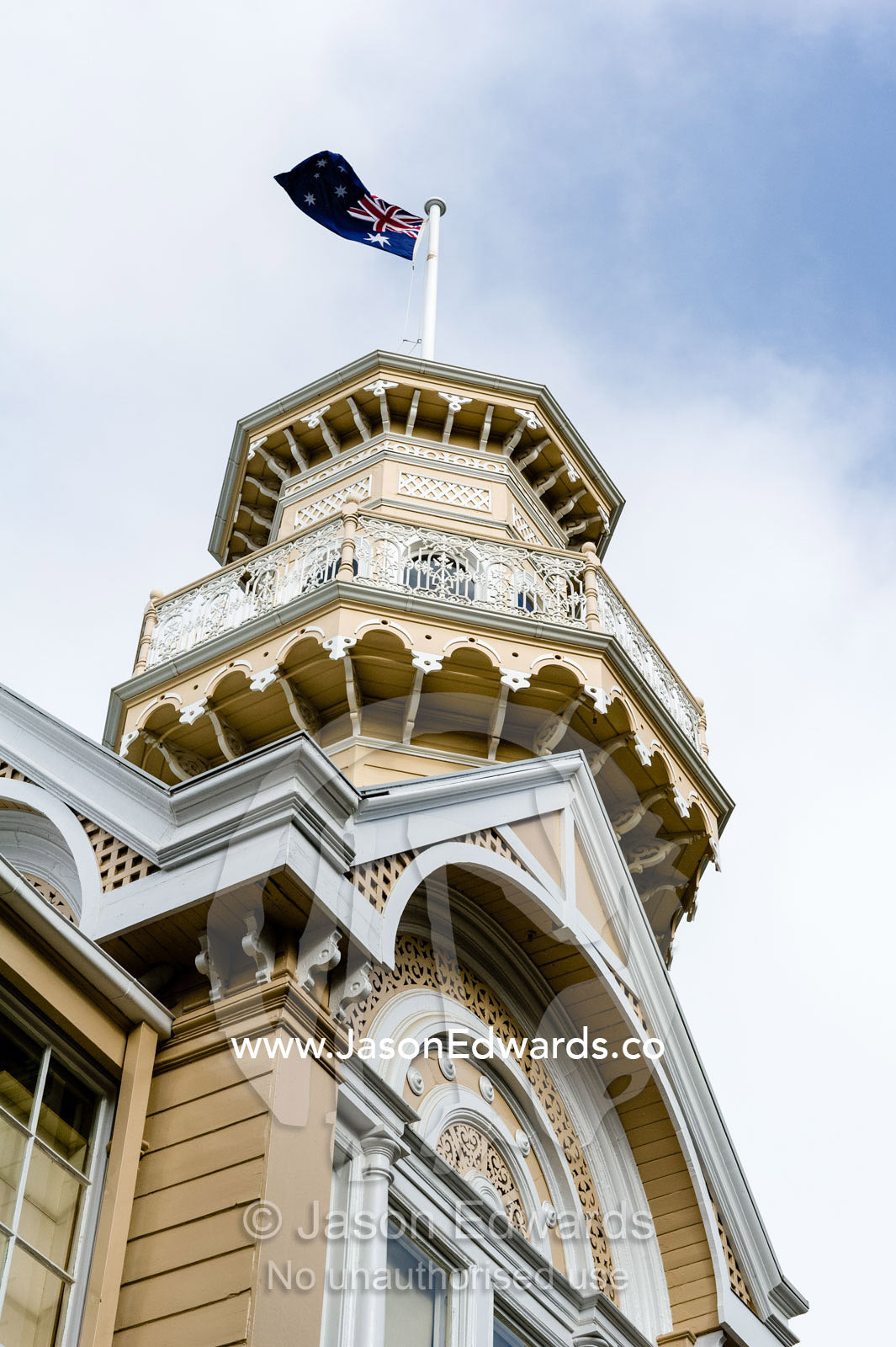 The antique facade and tower of an historic school in rural Victoria. Braemar College, Woodend, Victoria, Australia.