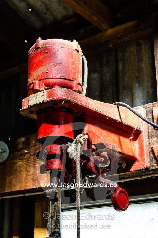 A Sunbeam Shearing plant in a shearing shed that powers the clippers for shearing sheep. Euroa, Strathbogie, Victoria, Australia.