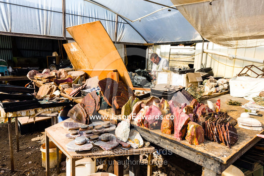 A collection of rocks waiting to be prepared for sale to collectors. Devon Meadows, Melbourne, Victoria, Australia.