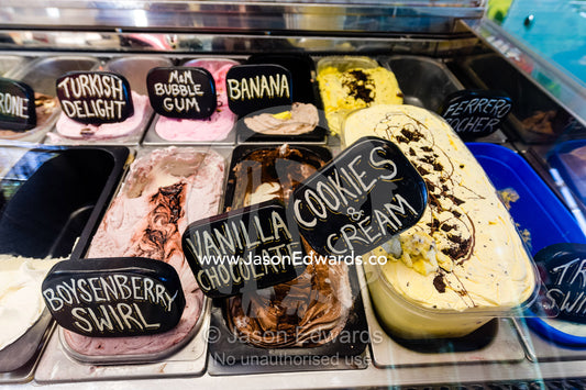Chocolate, strawberry, vanilla, cookies and cream handmade ice-cream in a display cabinet. Robe, Limestone Coast, South Australia, Australia.