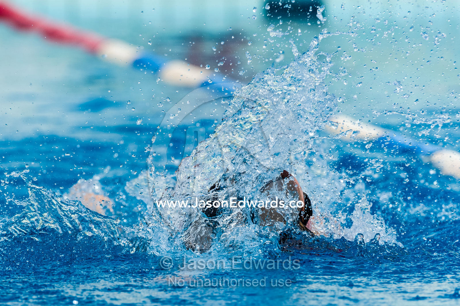 Students competing in races at a school swimming carnival. Fitzroy, Melbourne, Victoria, Australia.