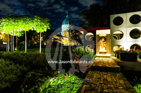 An architecturally designed outdoor patio and garden setting with spotlights at a garden show. Melbourne International Flower and Garden Show, Carlton Gardens, Carlton, Melbourne, Victoria, Australia.