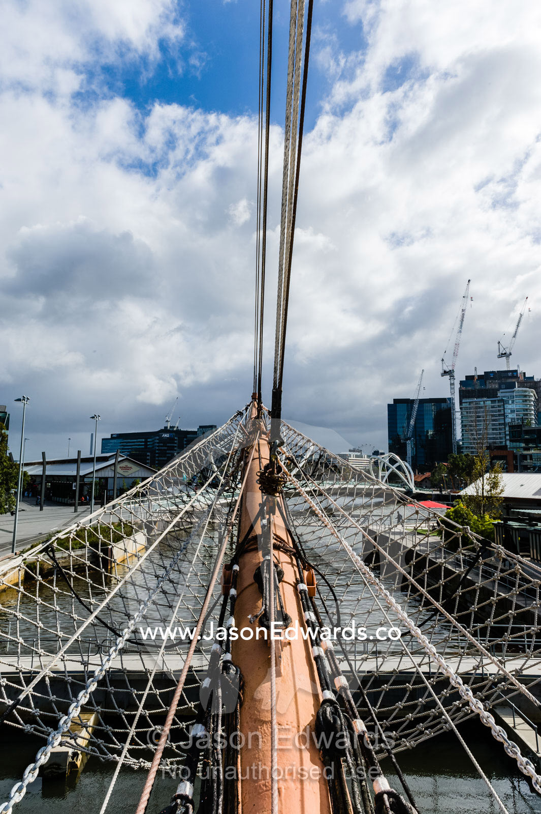 Net webbing and ropes attached to the bowsprit of an antique sailing ship museum. Polly Woodside, South Wharf Precinct, Yarra River, Melbourne, Victoria, Australia.