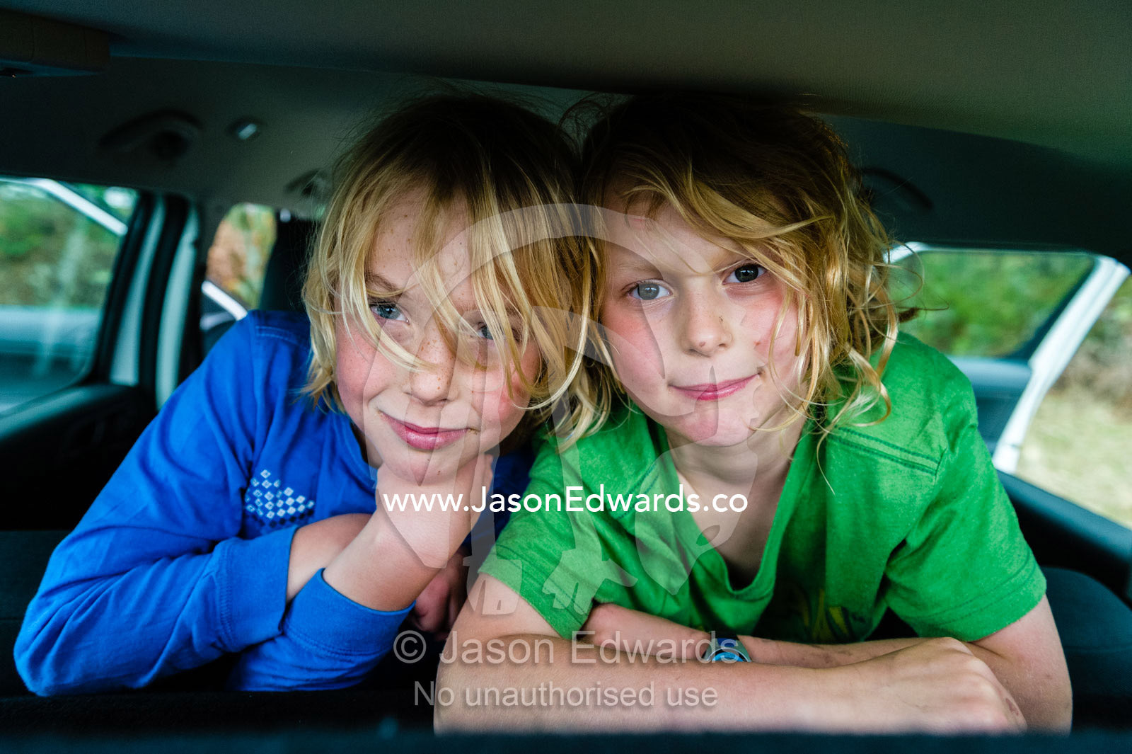 Portrait of boys in a car. Mafeking Rover Park, Strathbogie Ranges, Caveat, Victoria, Australia.