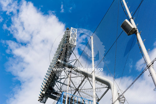 A large lighting structure above a baseball stadium in Tokyo. Meiji Jingu Stadium, Tokyo, Japan.
