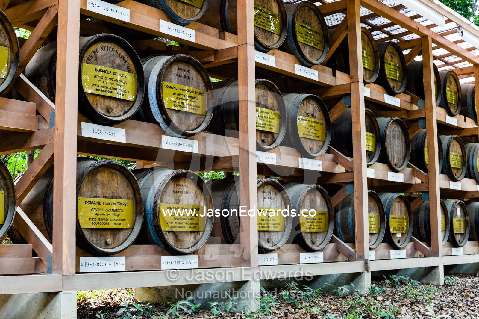 Rows of wine barrels presented as gifts to the temple from French vineyards. Meiji Shrine, Shinto Shrine, Shibuya, Tokyo, Japan.