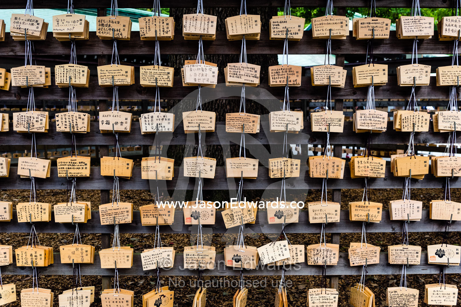 Ema are small wooden plaques where Shinto worshippers write prayers or wishes. They are left hanging at the shrine, where the kami, spirits or gods, receive them. Meiji Shrine, Shinto Shrine, Shibuya, Tokyo, Japan.