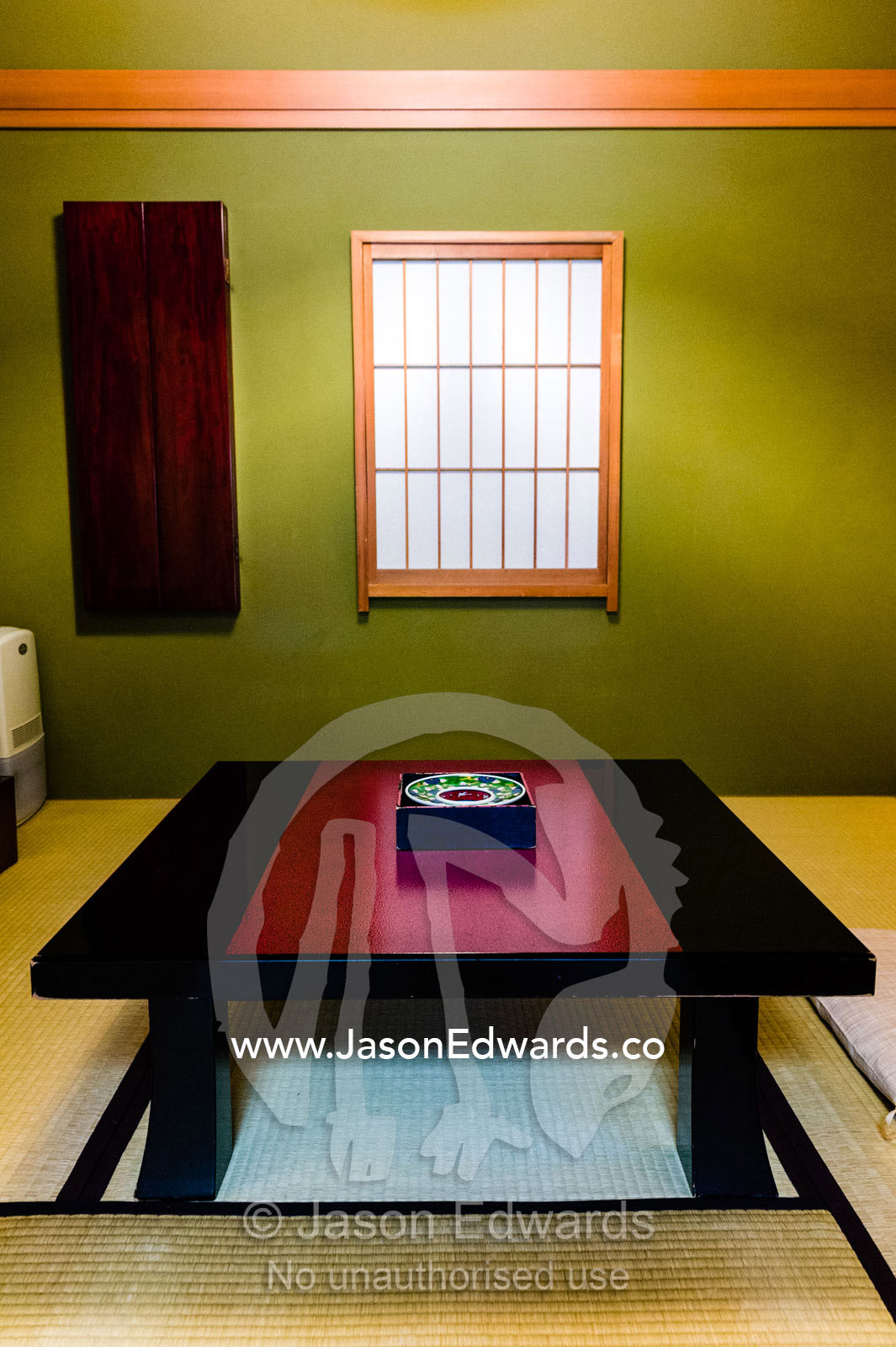 A traditional Japanese centre table called a Zataku in an ryokan. Unryu Onsen, Izu Peninsula, Shizuoka Prefecture, Japan.