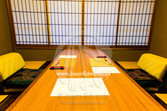 A traditional Japanese centre table called a Zataku in an ryokan. Unryu Onsen, Izu Peninsula, Shizuoka Prefecture, Japan.