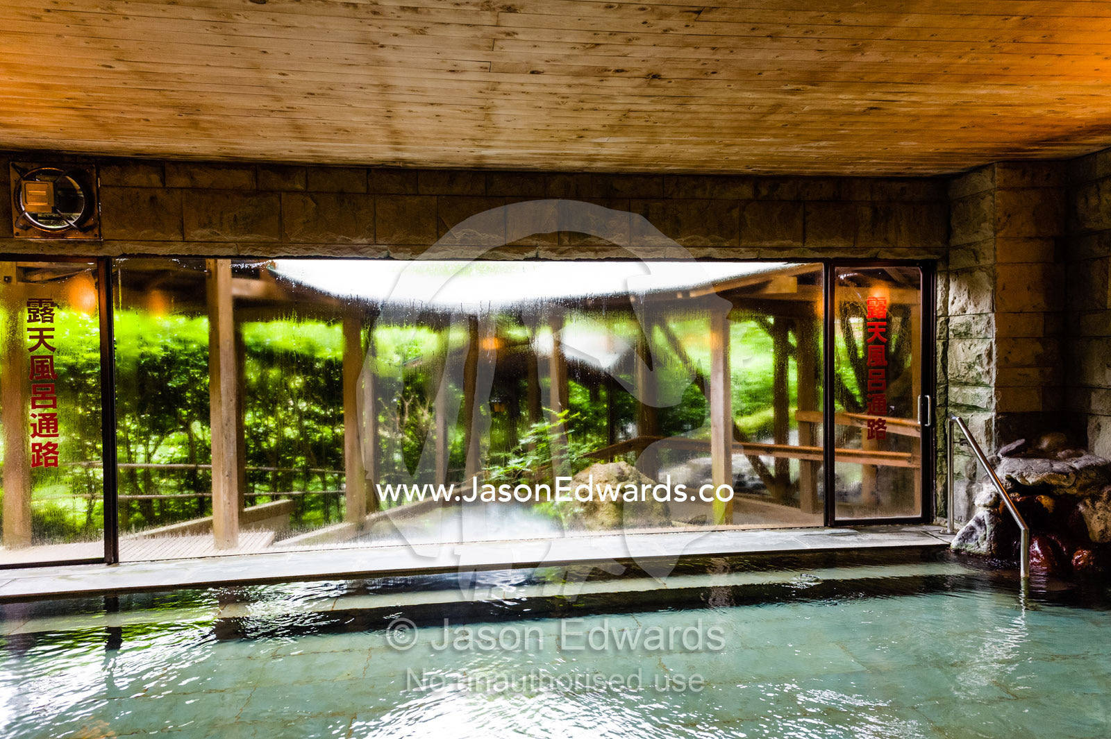 An indoor hot spring onsen for bathing in a ryokan. Unryu Onsen, Izu Peninsula, Shizuoka Prefecture, Japan.