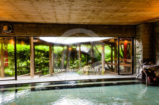 An indoor hot spring onsen for bathing in a ryokan. Unryu Onsen, Izu Peninsula, Shizuoka Prefecture, Japan.