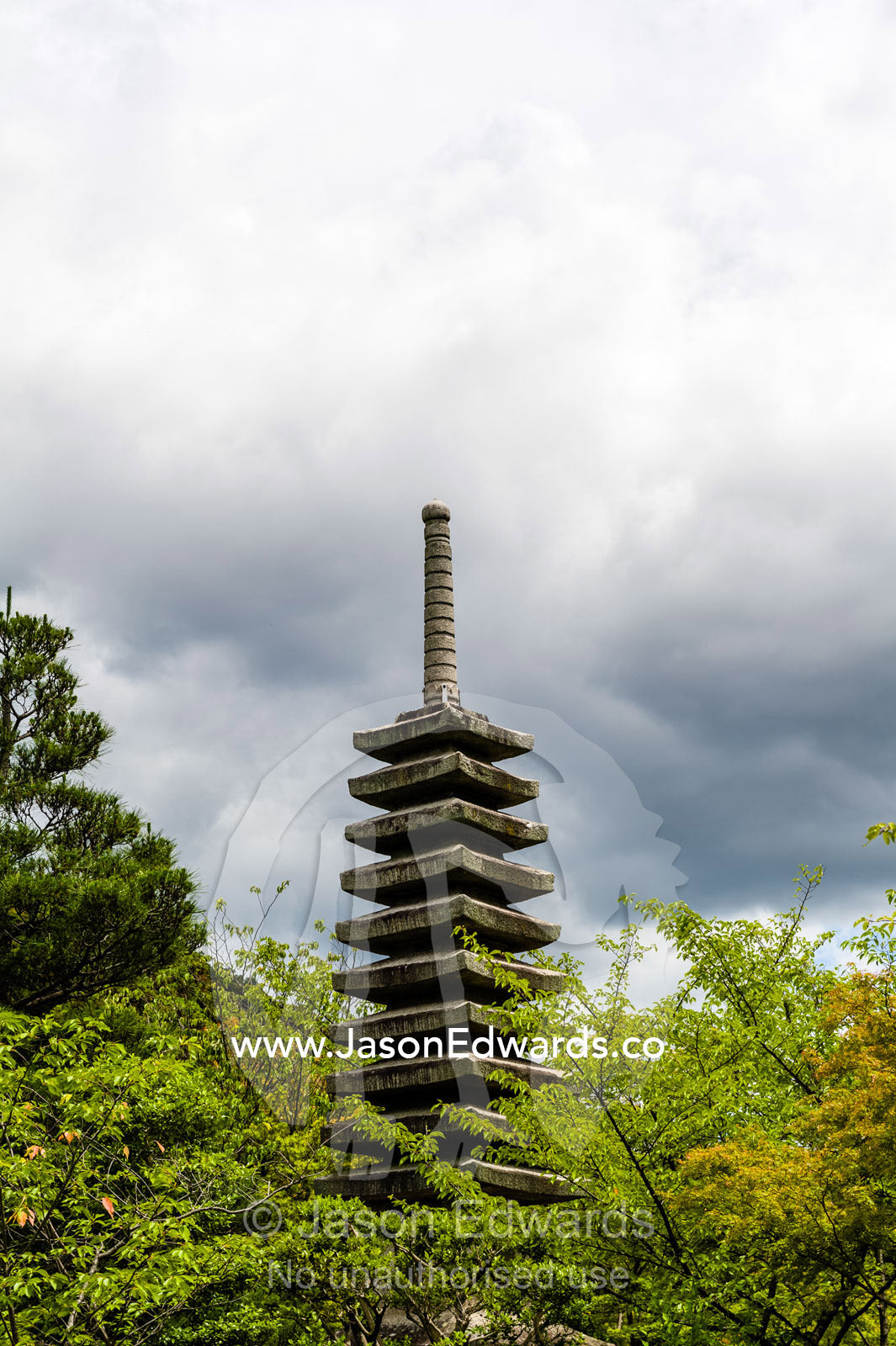 The pagoda statue in the garden of a buddhist temple. Kiyomizu-dera Temple, Higashiyama Ward, Kyoto, Kyoto Prefecture, Japan.