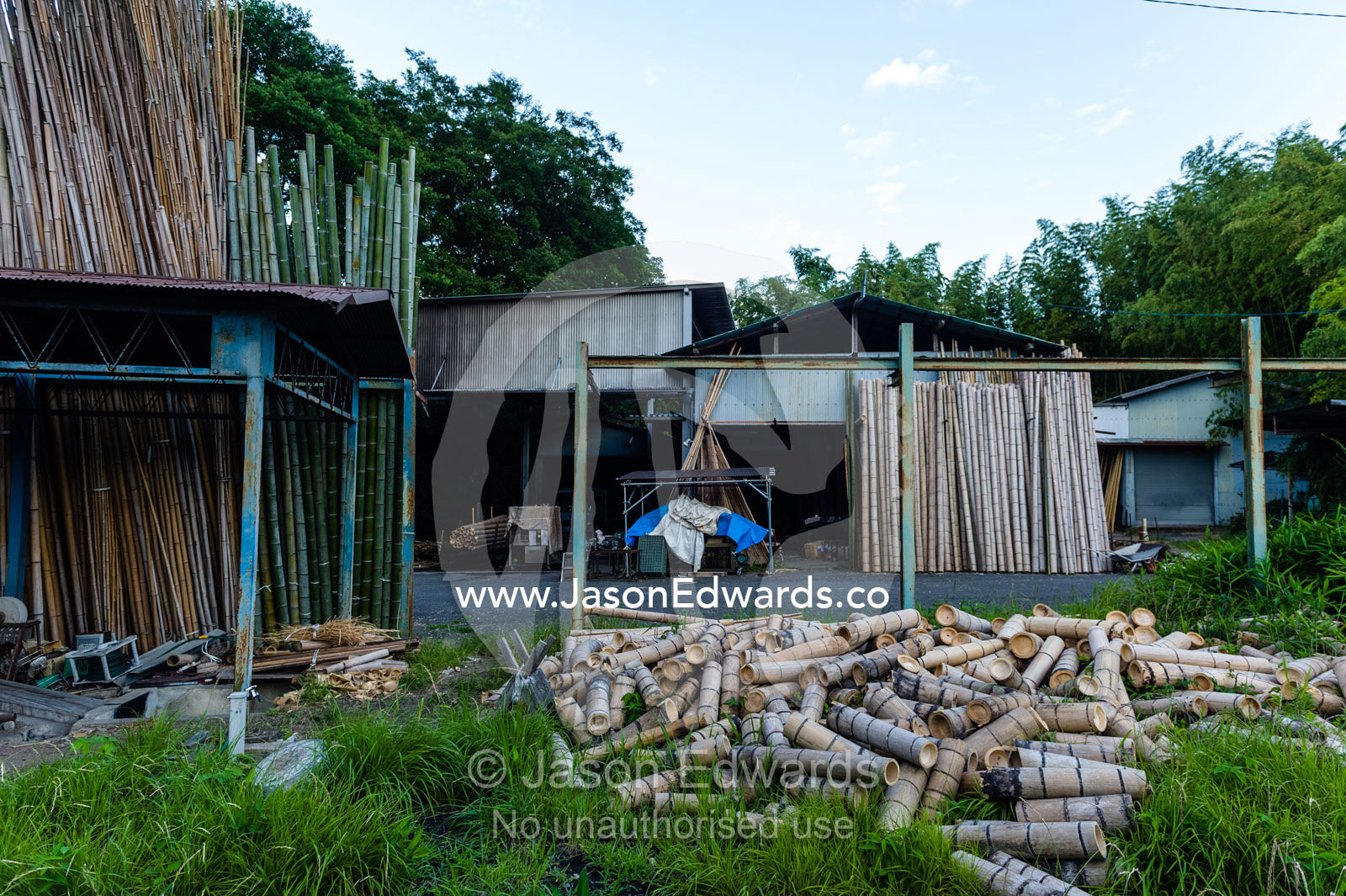 A lumber yard where Giant Bamboo is cut-up for traditional Japanese gardens. Arashiyama Bamboo Grove, Arashiyama District, Kyoto, Japan.