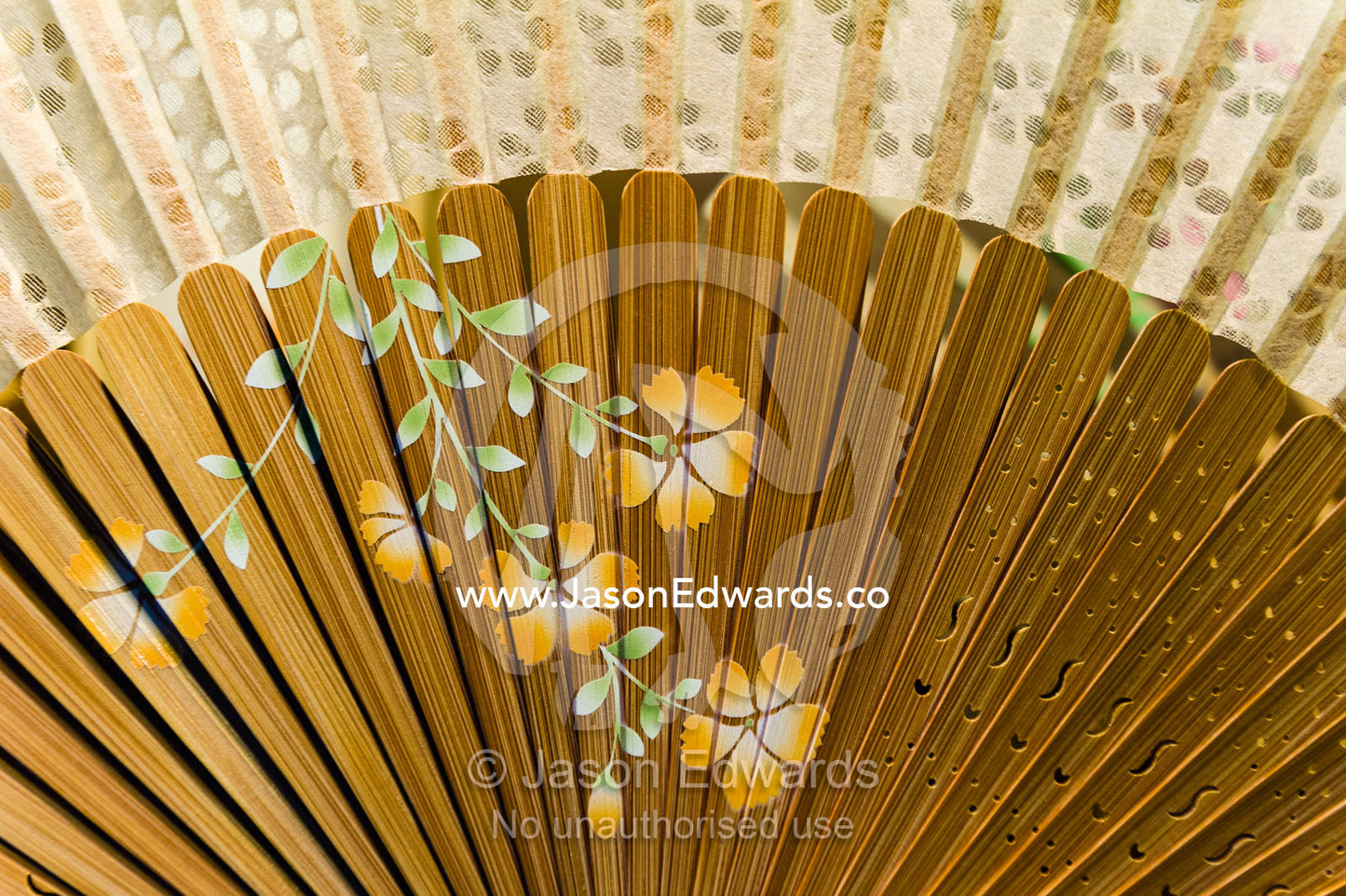 A shop near a temple sells delicate traditionally decorated Japanese fans. Yasaka Pagoda, Hokanji Temple, Higashiyama, Kyoto, Japan.