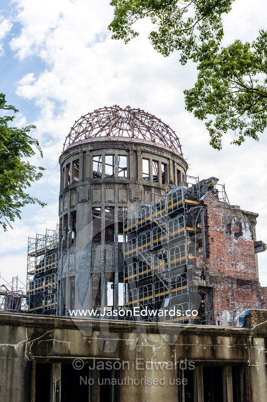 The ruin of the Hiroshima Prefectural Industrial Promotion Hall known as the Atomic Bomb Dome or Genbaku Dōmu. Hiroshima Peace Memorial Park, Hiroshima, Honshu Island, Japan.