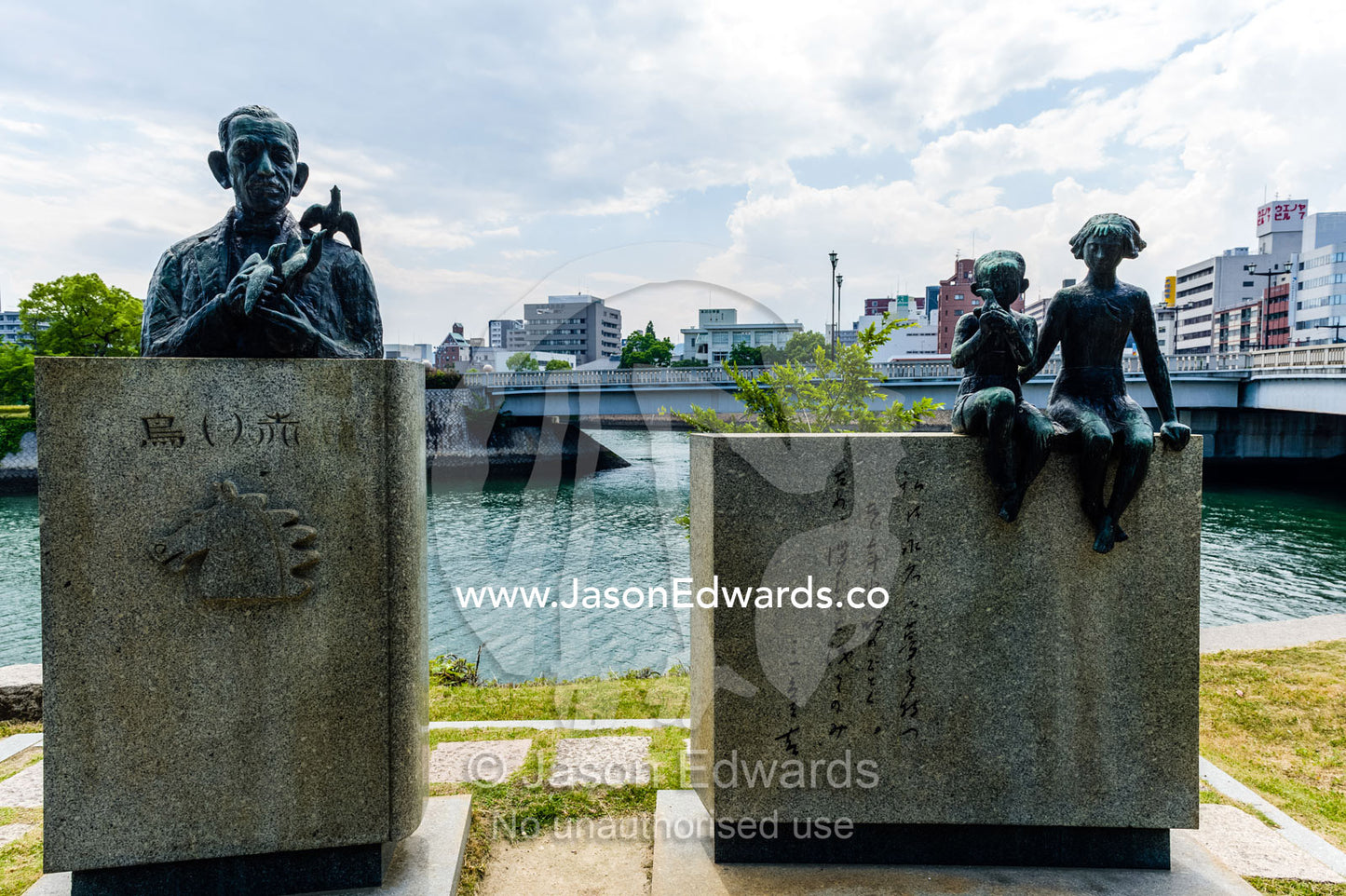 A memorial to Japanese novelist Miekichi Suzuki at Ground Zero in Hiroshima. Hiroshima Peace Memorial Park, Hiroshima, Honshu Island, Japan.