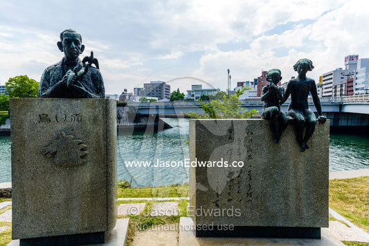 A memorial to Japanese novelist Miekichi Suzuki at Ground Zero in Hiroshima. Hiroshima Peace Memorial Park, Hiroshima, Honshu Island, Japan.