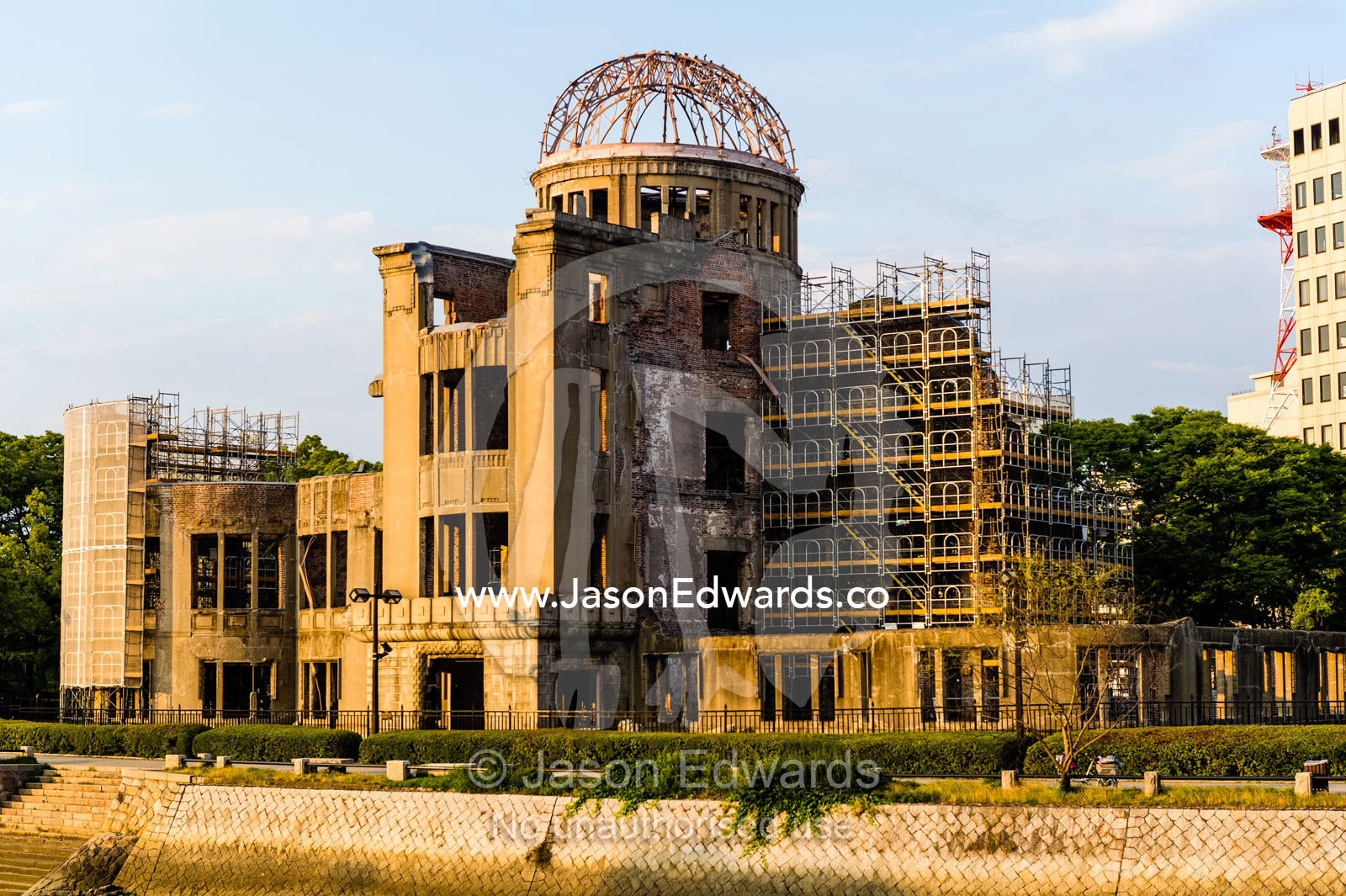 Sunset on the ruin of the Hiroshima Prefectural Industrial Promotion Hall known as the Atomic Bomb Dome or Genbaku Dōmu. Hiroshima Peace Memorial Park, Hiroshima, Honshu Island, Japan.
