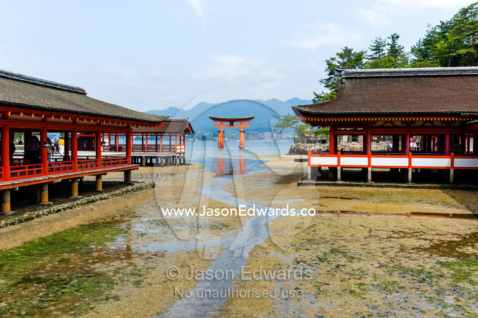 The famous floating torii gate at Itsukushima Shrine is a Ryōbu-style torii at low tide. Itsukushima Shrine, Miyajima, Itsukushima Island, Inland Sea of Japan, Hiroshima Bay, Japan.