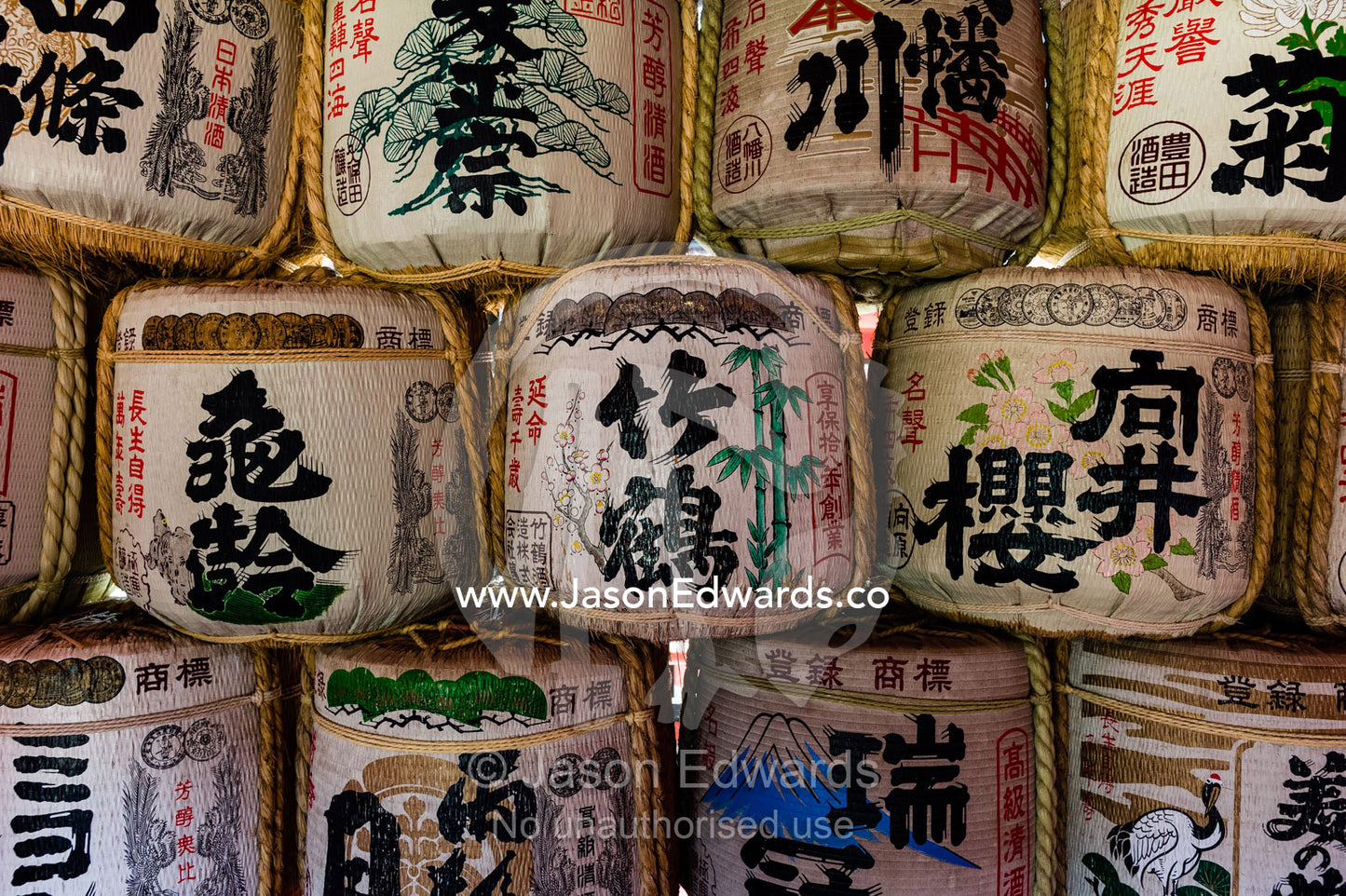 Rows of Saka Daru Japanese sake drums presented as gifts to the temple. Itsukushima Shrine, Miyajima, Itsukushima Island, Inland Sea of Japan, Hiroshima Bay, Japan.
