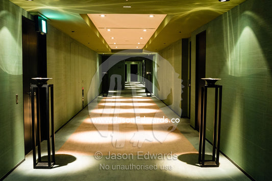 Spotlights in a corridor leading to suites in a boutique hotel in Tokyo. Park Hyatt, Tokyo, Japan.