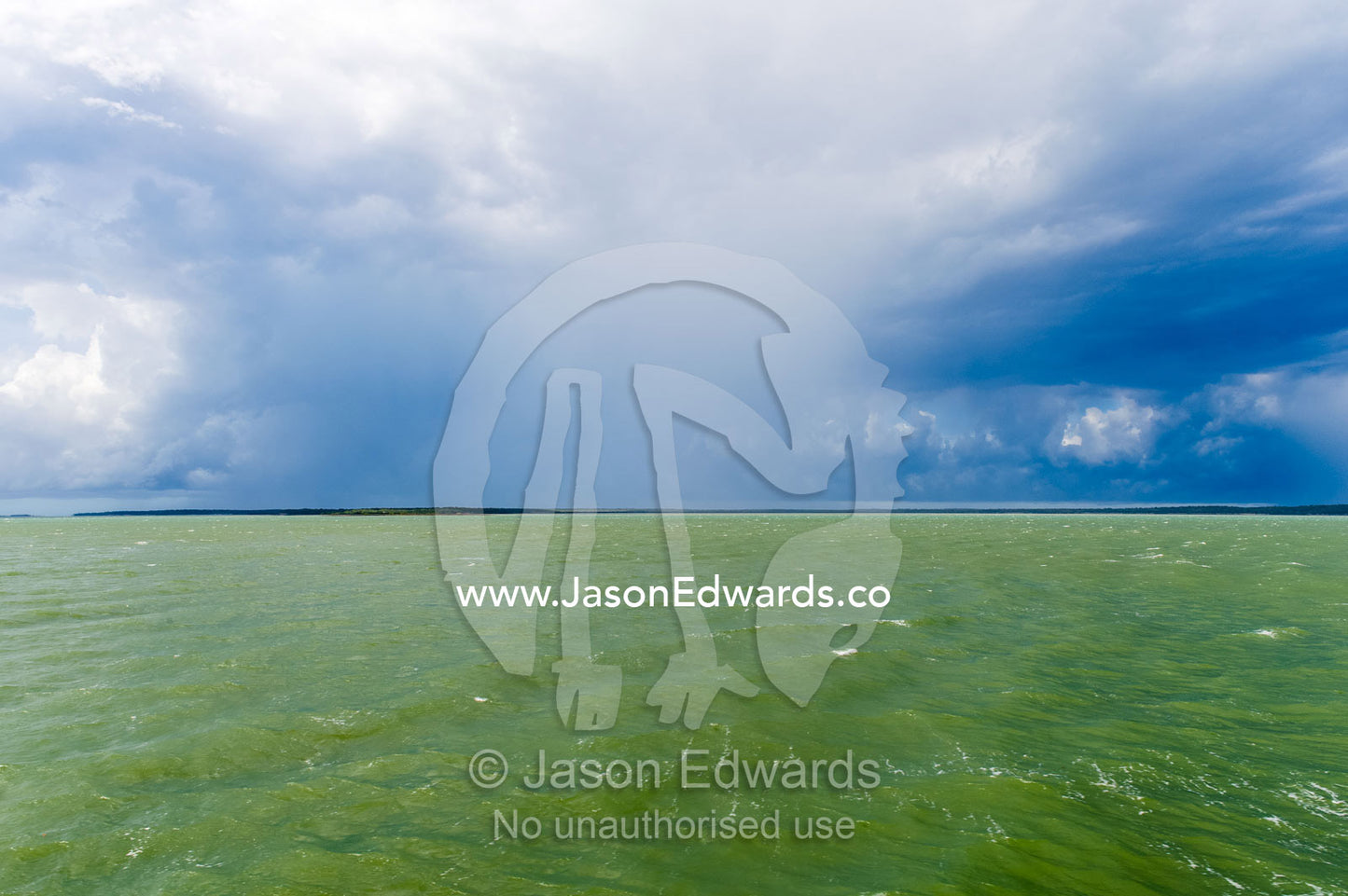 The ocean surface turns green during a tropical storm. Gladstone, Queensland, Australia.