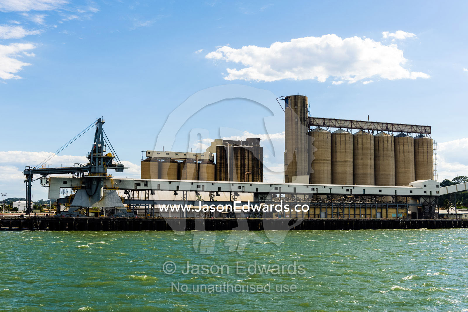 A ship loading gantry at Auckland point, where they load ships with grain, Calcite, dead burned magnesia and other bulk cargoes. Gladstone, Queensland, Australia.