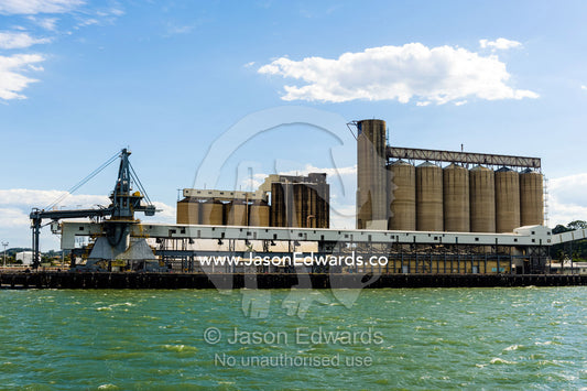 A ship loading gantry at Auckland point, where they load ships with grain, Calcite, dead burned magnesia and other bulk cargoes. Gladstone, Queensland, Australia.