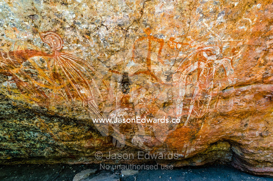 An Aboriginal rock painting art incline gallery featuring a Nammarrnde type figure. Burrunggui, Nourlangie Rock, Arnhem Land, Kakadu National Park, Northern Territory, Australia.