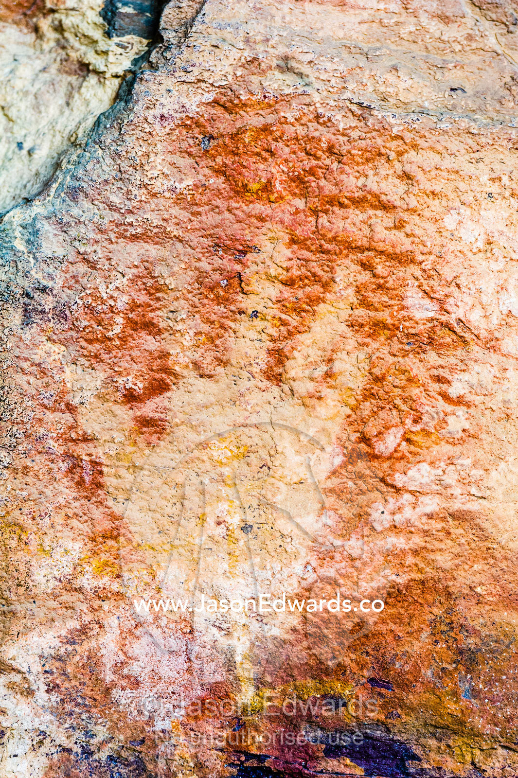 An ancient image of a human hand stencil painted in an Aboriginal rock art gallery. Burrunggui, Nourlangie Rock, Arnhem Land, Kakadu National Park, Northern Territory, Australia.