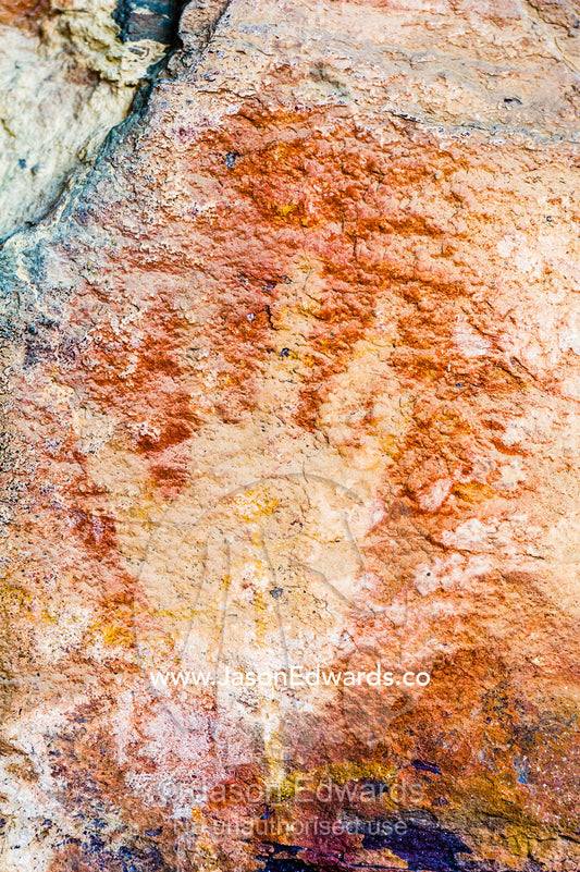 An ancient image of a human hand stencil painted in an Aboriginal rock art gallery. Burrunggui, Nourlangie Rock, Arnhem Land, Kakadu National Park, Northern Territory, Australia.