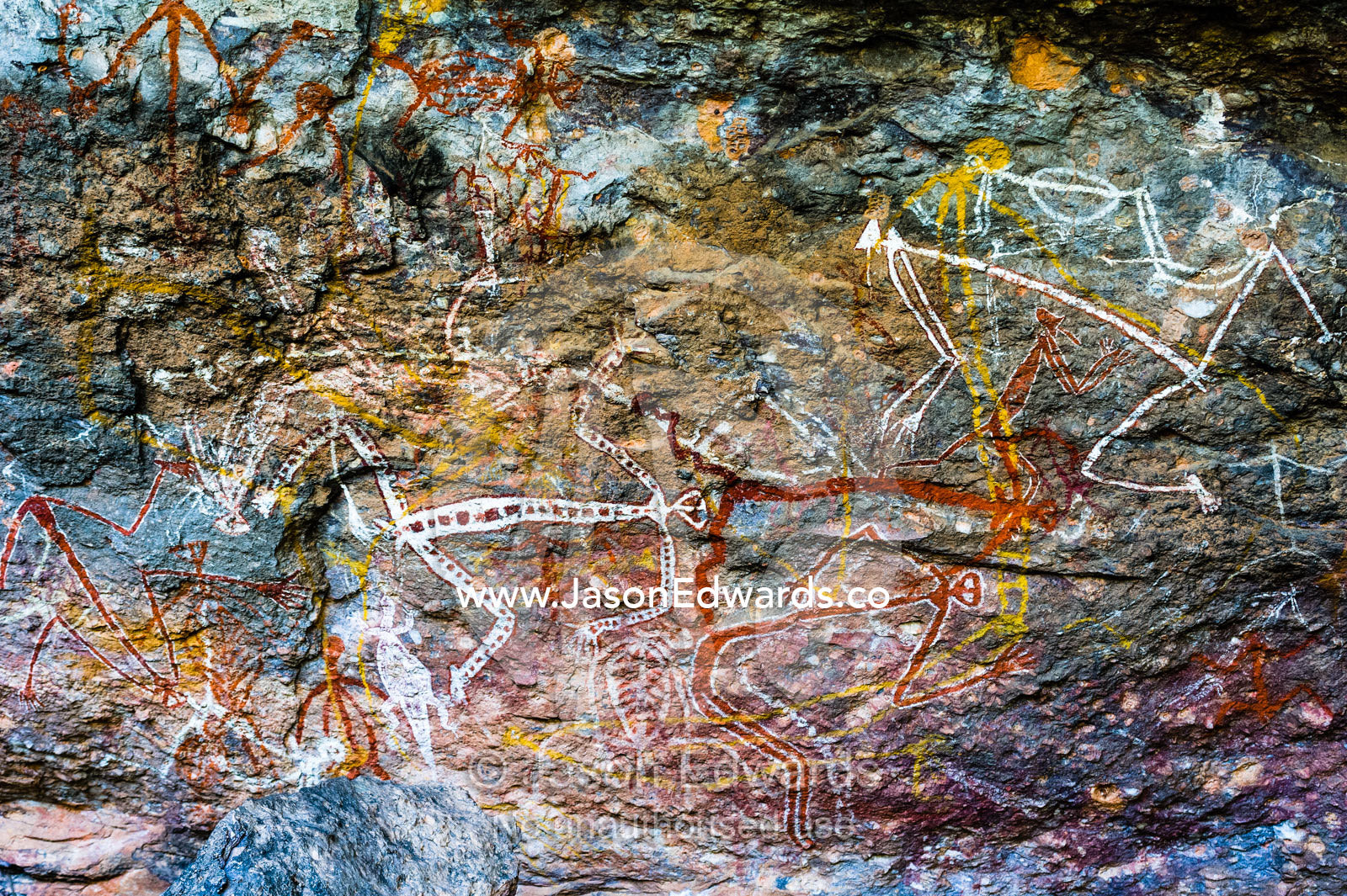 An Aboriginal rock painting art gallery featuring Mimi spirits which are fairy-like beings in Arnhem Land. Burrunggui, Nourlangie Rock, Arnhem Land, Kakadu National Park, Northern Territory, Australia.