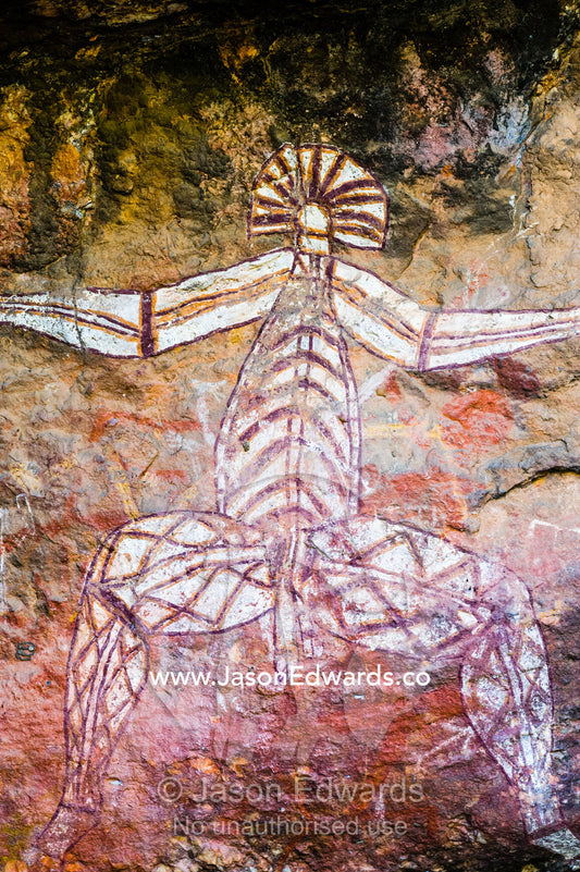 An Aboriginal rock painting art gallery featuring Nabulwinjbulwinj who is a dangerous spirit. Burrunggui, Nourlangie Rock, Arnhem Land, Kakadu National Park, Northern Territory, Australia.