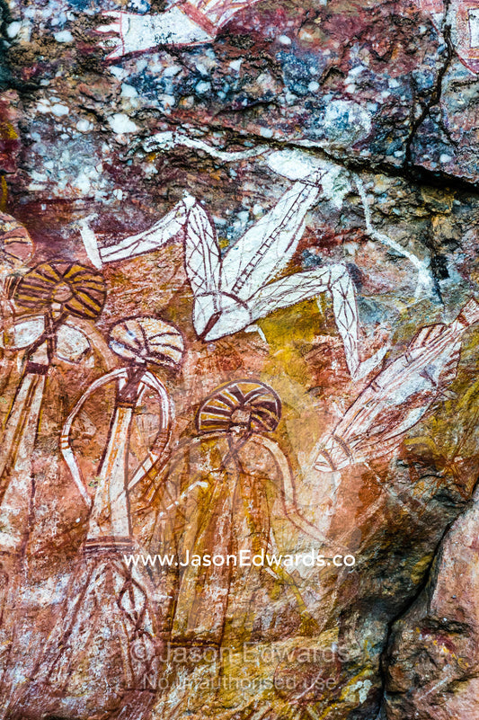An Aboriginal rock painting art gallery featuring Barginj who is Namarrgons wife. Burrunggui, Nourlangie Rock, Arnhem Land, Kakadu National Park, Northern Territory, Australia.
