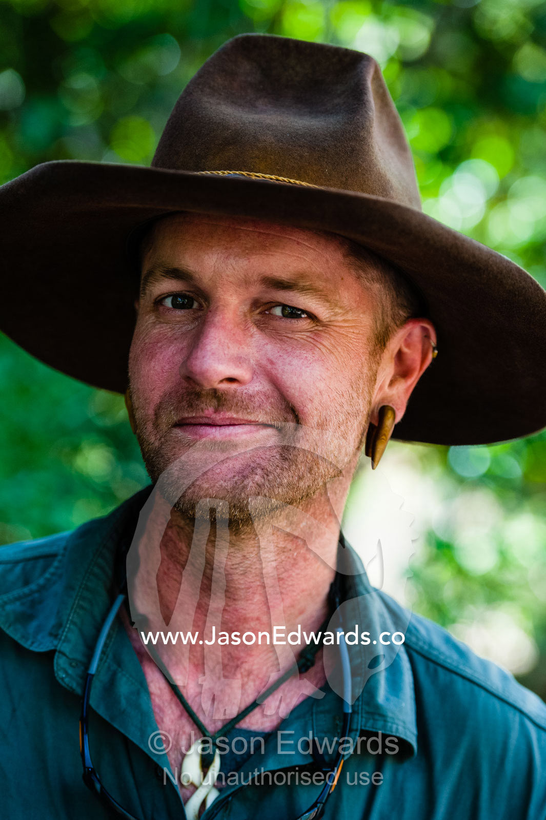 A national park ranger in an Akubra slouch hat. Burrunggui, Nourlangie Rock, Arnhem Land, Kakadu National Park, Northern Territory, Australia.