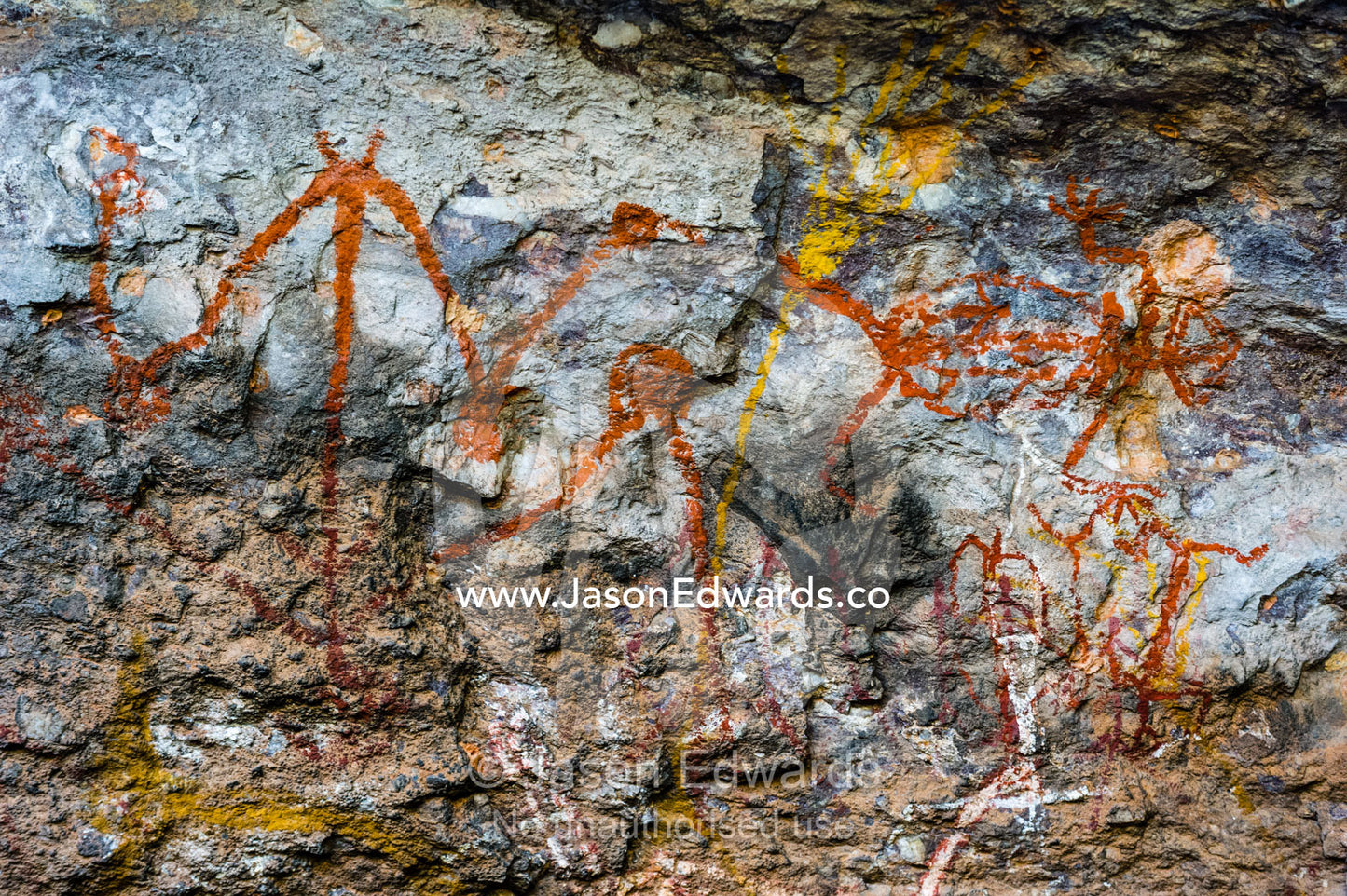 An Aboriginal rock painting art incline gallery featuring a Mimi spirits, dancing figures. Burrunggui, Nourlangie Rock, Arnhem Land, Kakadu National Park, Northern Territory, Australia.