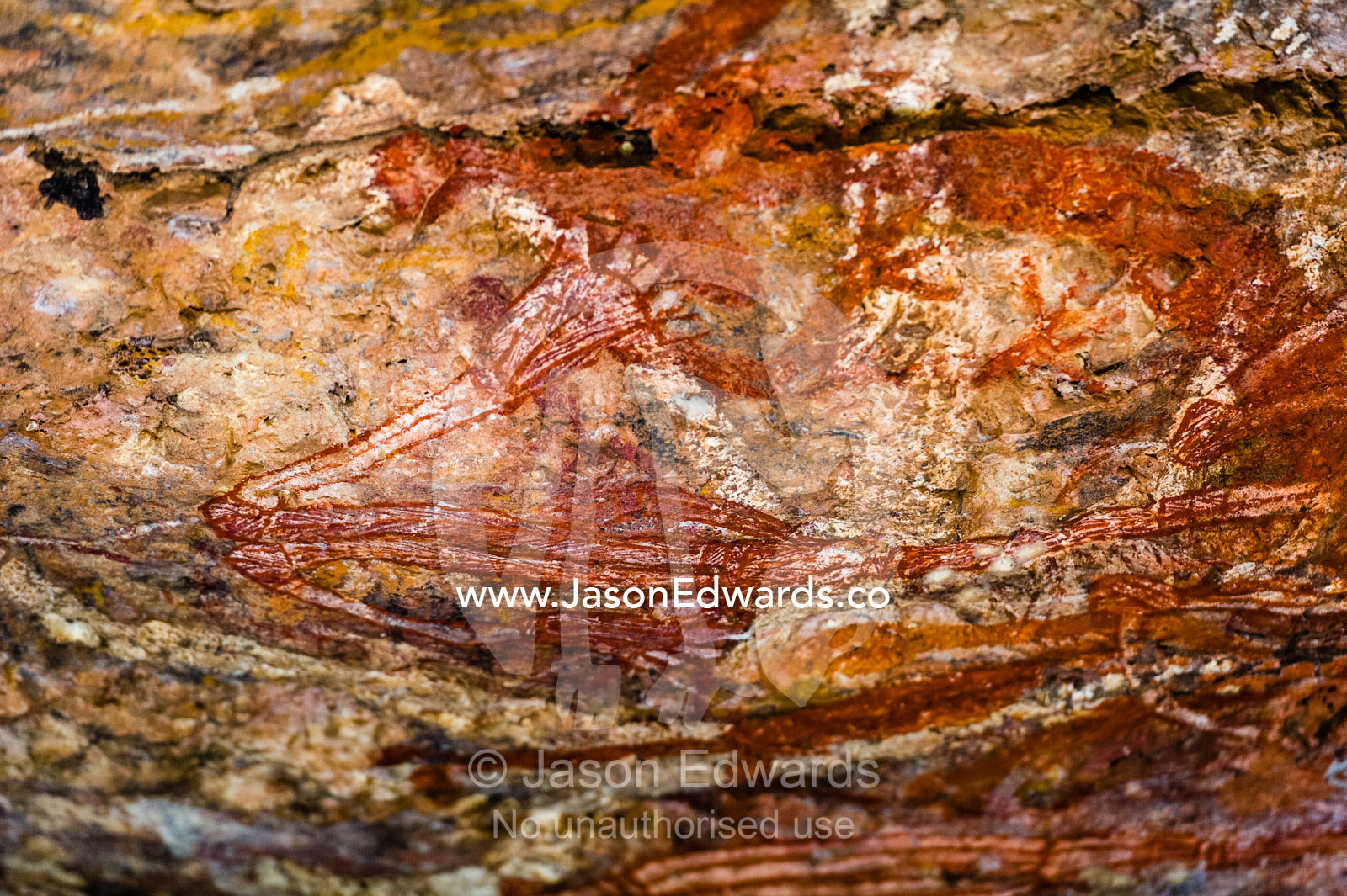Ancient Aboriginal rock painting art in an incline. Burrunggui, Nourlangie Rock, Arnhem Land, Kakadu National Park, Northern Territory, Australia.