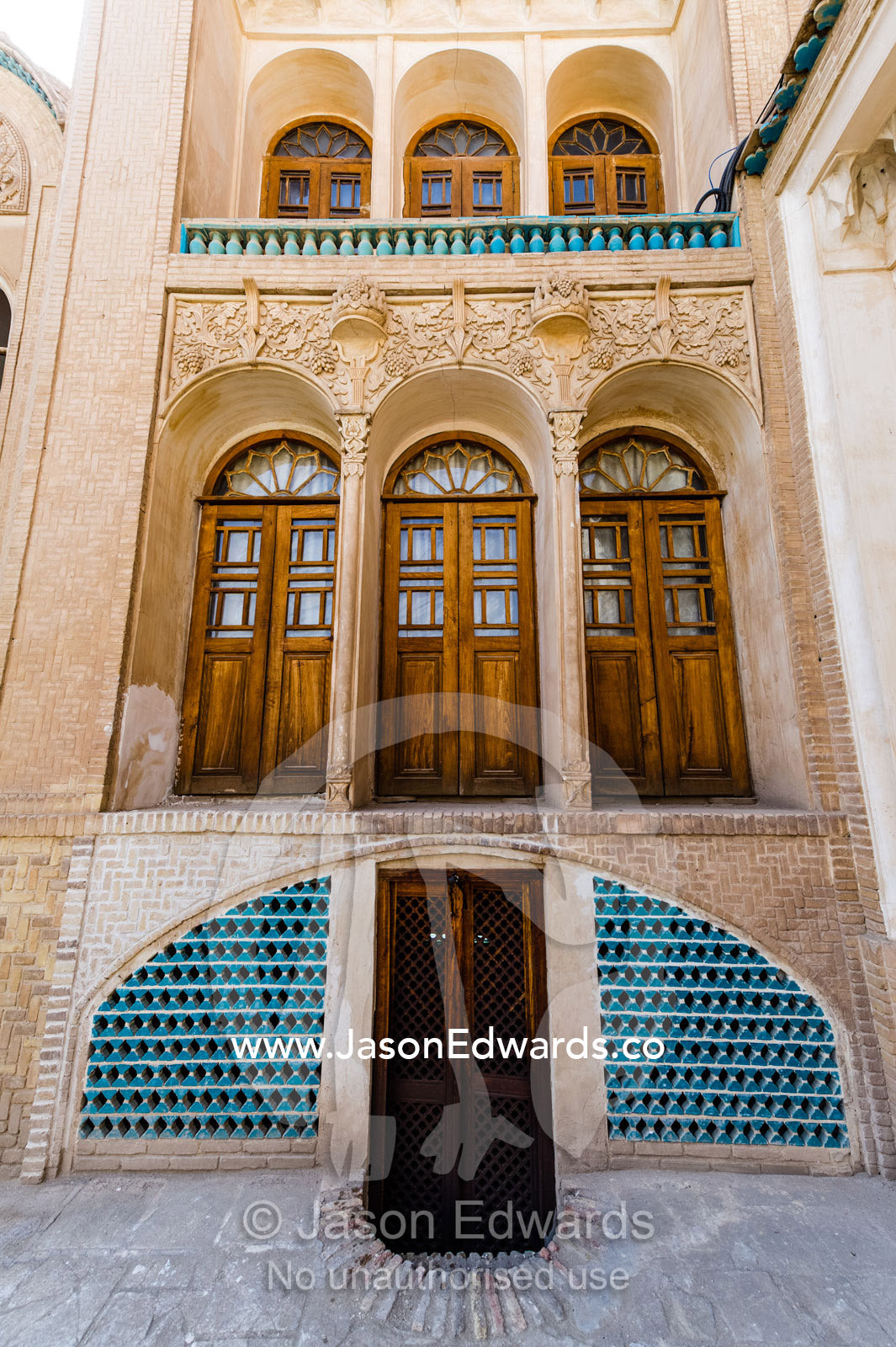Marvelous arched timber doorways in a wealthy merchant's home. Borujerdis House, Kashan, Isfahan Province, Islamic Republic of Iran.