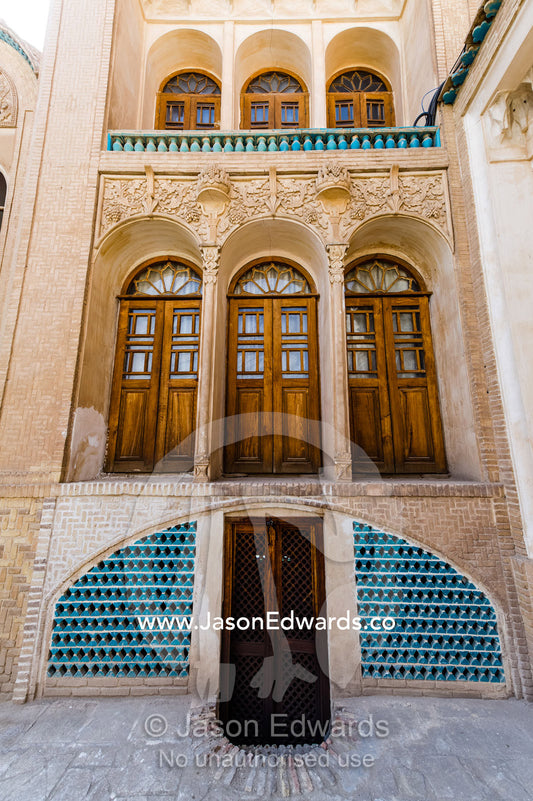 Marvelous arched timber doorways in a wealthy merchant's home. Borujerdis House, Kashan, Isfahan Province, Islamic Republic of Iran.