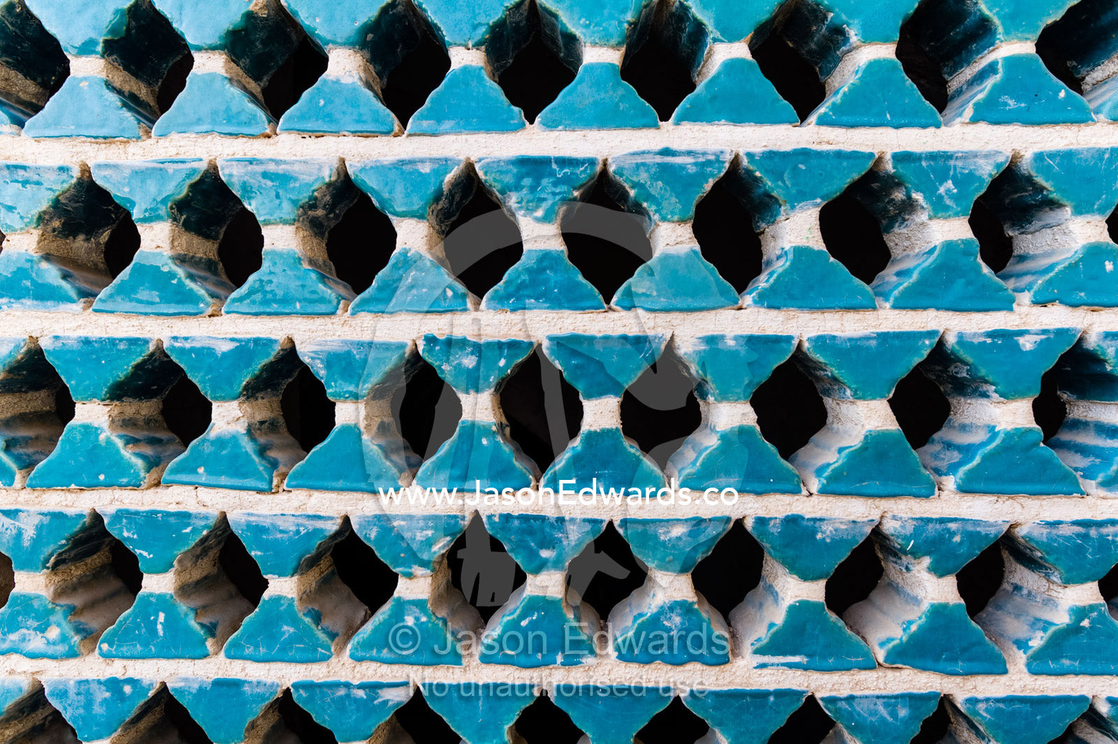 Blue ceramic lattice windows in a wealthy merchant's home. Borujerdis House, Kashan, Isfahan Province, Islamic Republic of Iran.