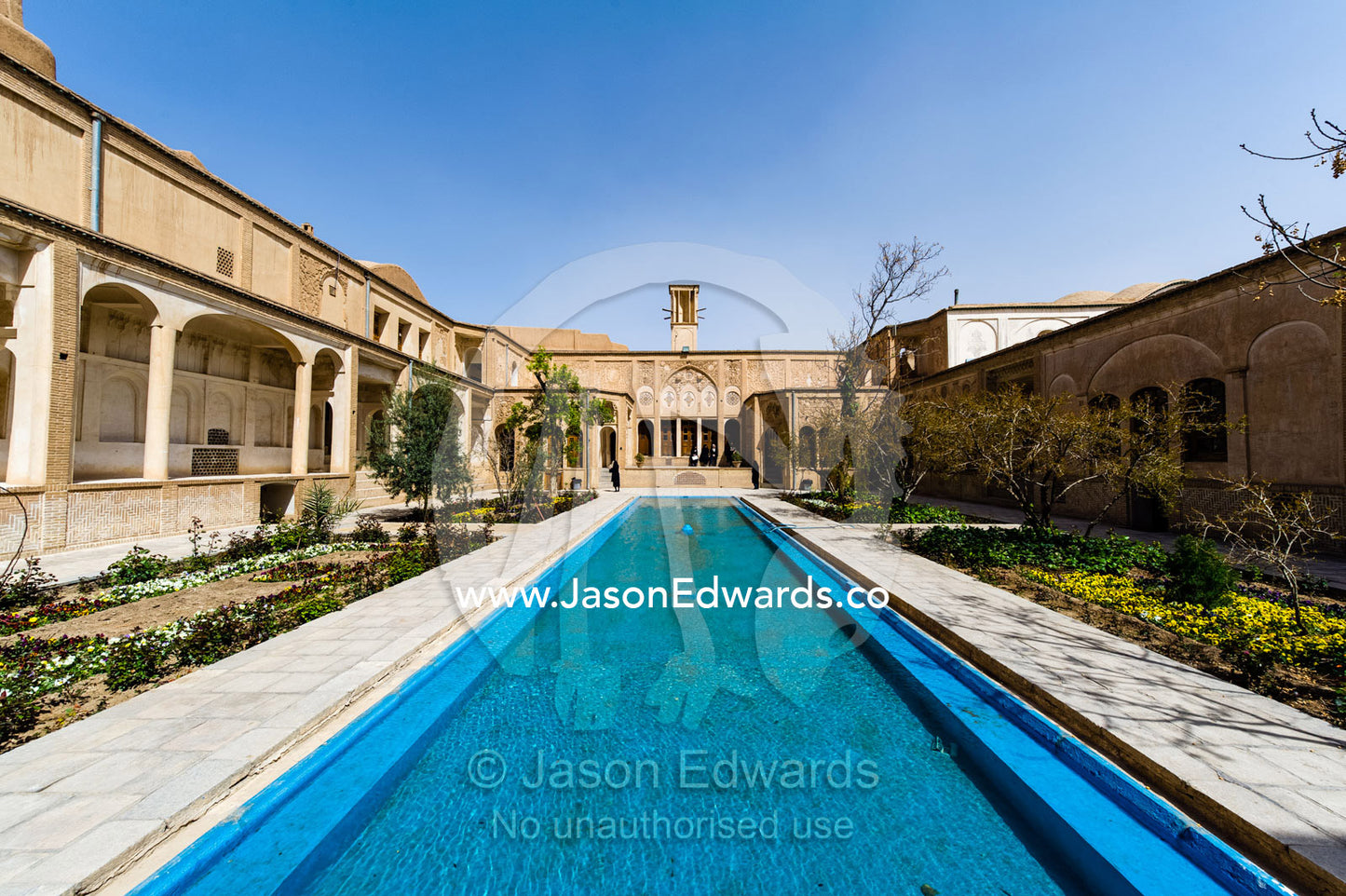A wide pond surrounded by gardens and columned verandahs in a wealthy merchant's home. Borujerdis House, Kashan, Isfahan Province, Islamic Republic of Iran.