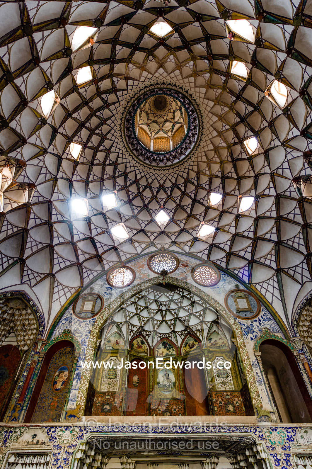 Skylights illuminate the vaulted spiralling geometric ceiling of the Borujerdis House. Borujerdis House, Kashan, Isfahan Province, Islamic Republic of Iran.