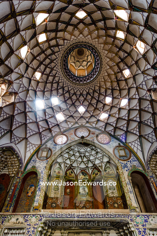 Skylights illuminate the vaulted spiralling geometric ceiling of the Borujerdis House. Borujerdis House, Kashan, Isfahan Province, Islamic Republic of Iran.