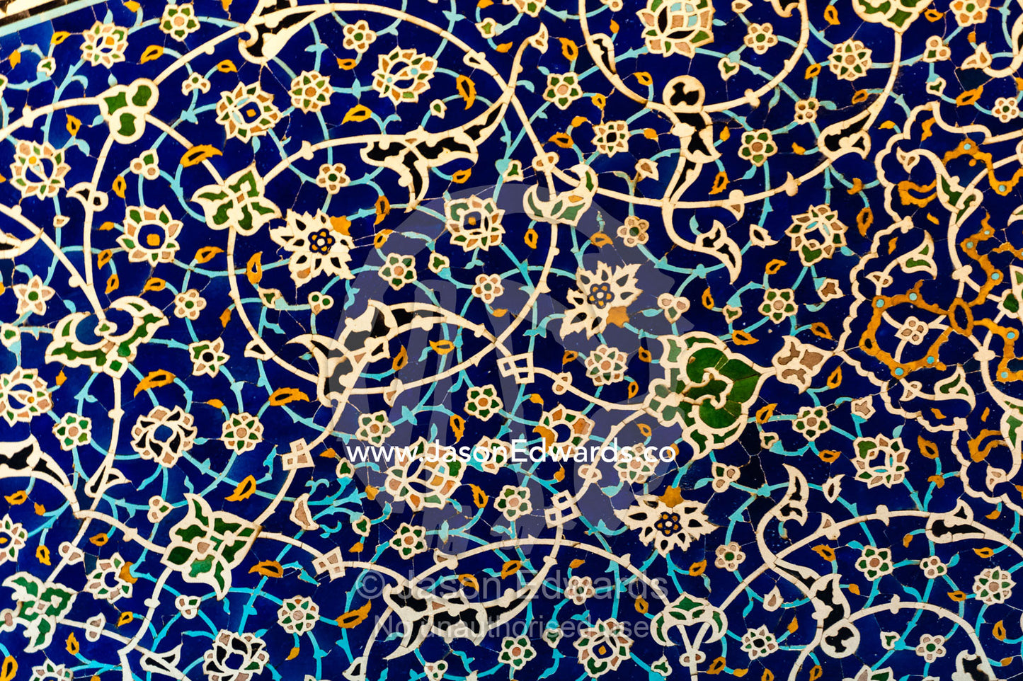 The beautiful and intricate tiled patterns on the wall of the Sheikh Lotfollah Mosque. Sheikh Lotfollah Mosque, Naqsh-e Jahan Square, Isfahan, Isfahan Province, Islamic Republic of Iran.