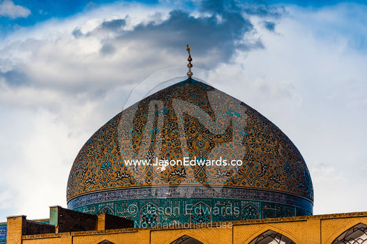 Patterns on the intricate tiled dome of the Sheikh Lotfollah Mosque at sunset. Sheikh Lotfollah Mosque, Naqsh-e Jahan Square, Isfahan, Isfahan Province, Islamic Republic of Iran.