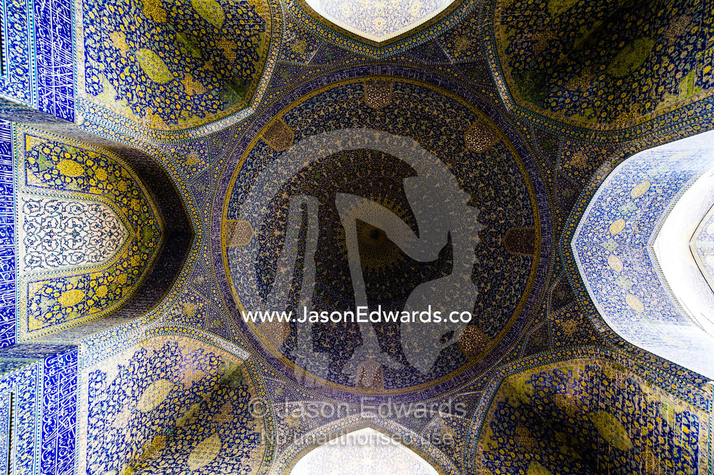 The intricately blue tiled dome of the Shah Mosque is one of the masterpieces of Persian Architecture. Shah Mosque, Isfahan, Isfahan Province, Islamic Republic of Iran.