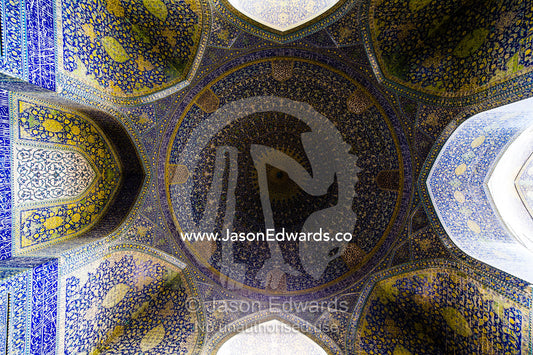 The intricately blue tiled dome of the Shah Mosque is one of the masterpieces of Persian Architecture. Shah Mosque, Isfahan, Isfahan Province, Islamic Republic of Iran.