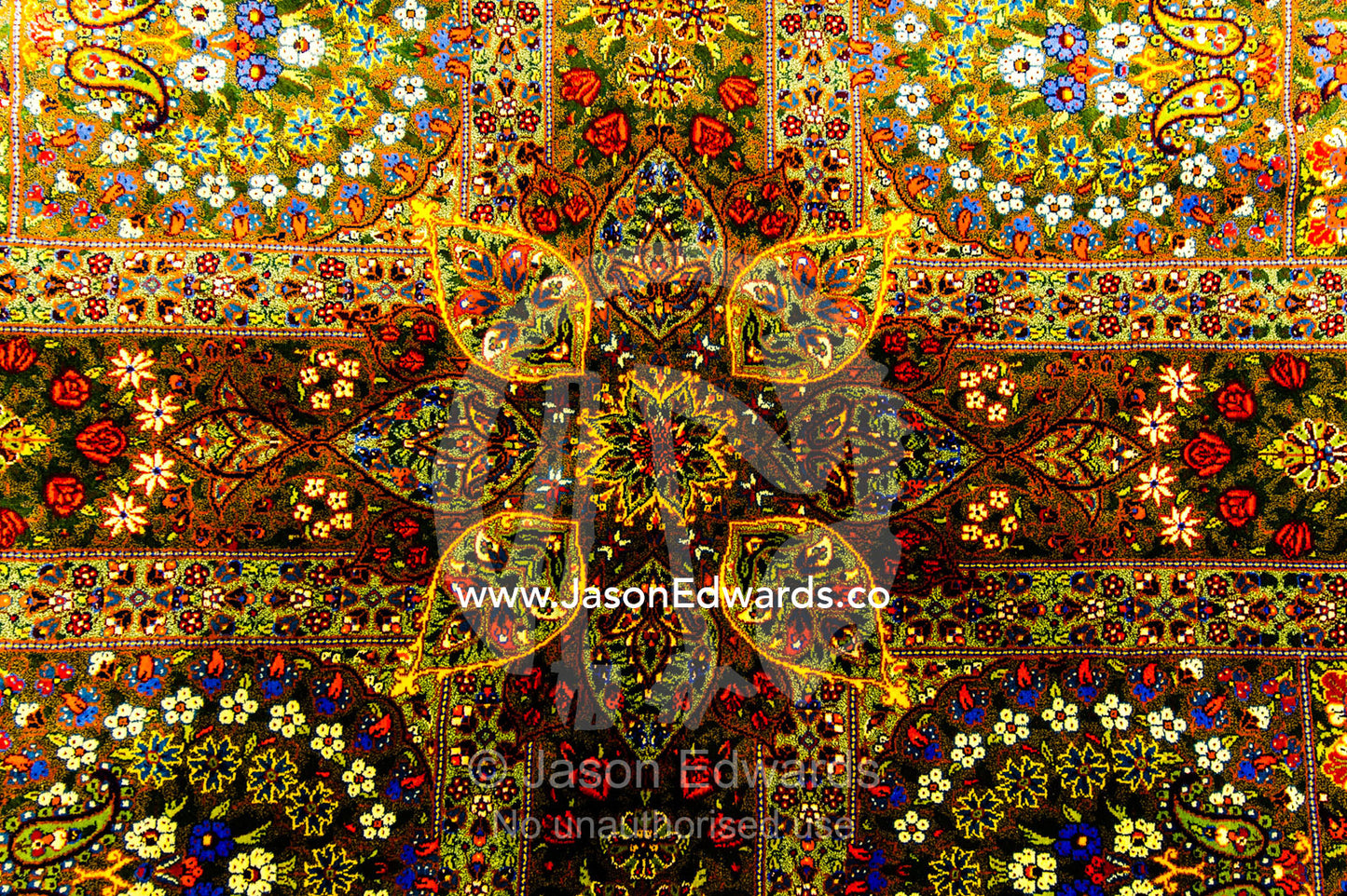 The intricate woven details of a high quality Persian carpet. Isfahan Bazaar, Isfahan, Islamic Republic of Iran.