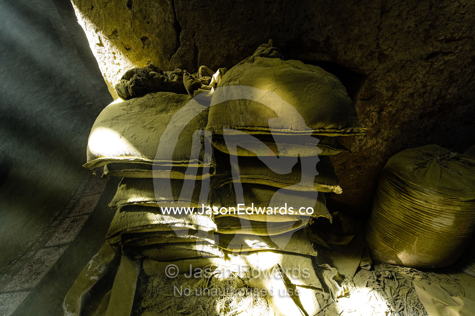 Sunrays touch bags of henna powder stored in an ancient henna mill. Yazd, Yazd Province, Islamic Republic of Iran.