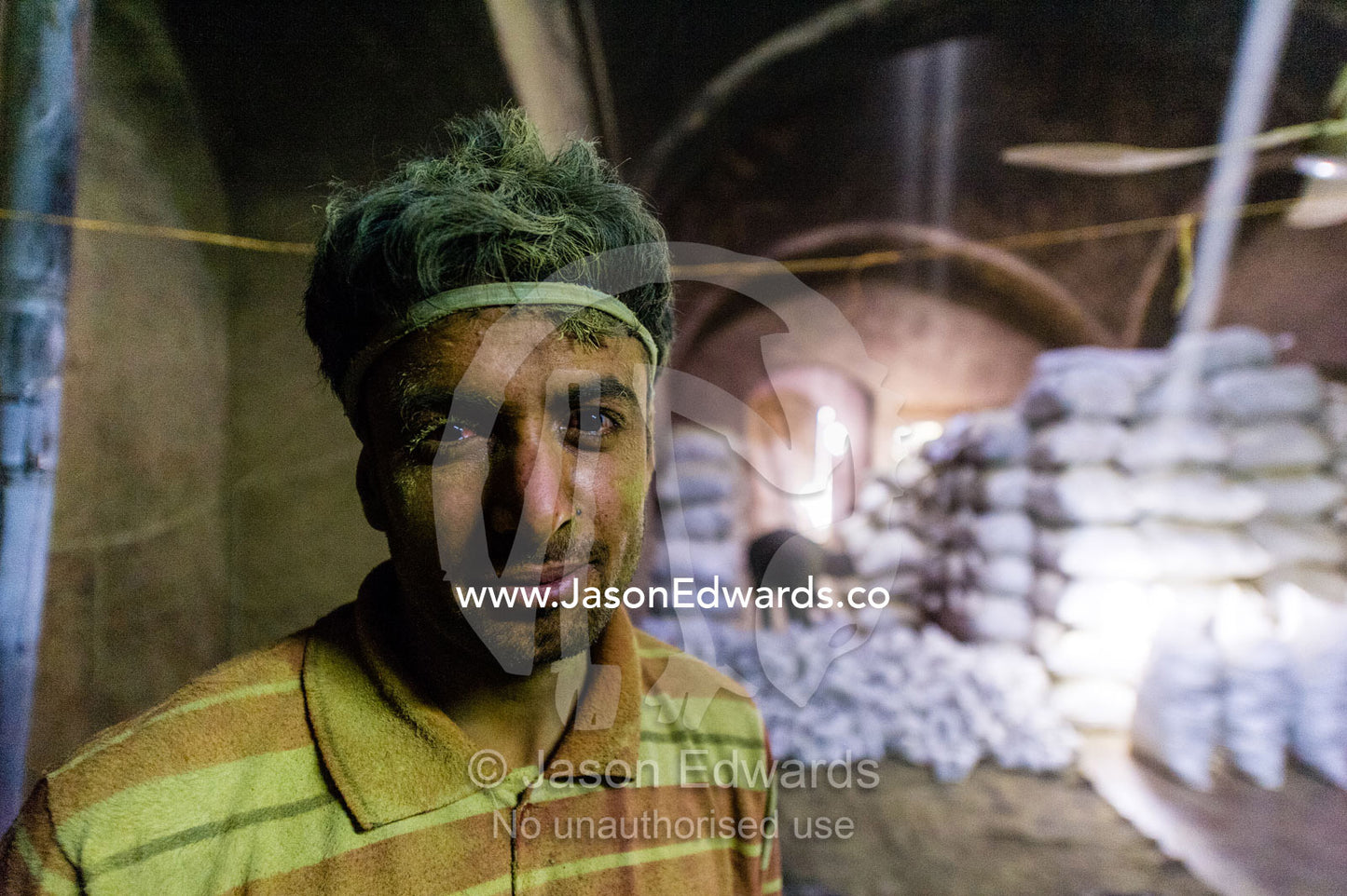 The exhausted face of a labourer working in an ancient henna mill. Yazd, Yazd Province, Islamic Republic of Iran.